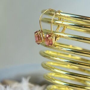 14k gold and sapphire dangle earrings.